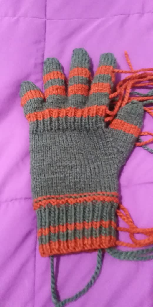 Unfinished grey glove
